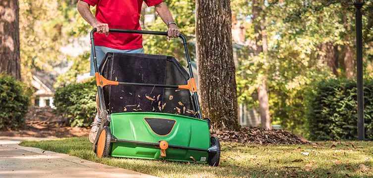 Lawn vacuum sweeper