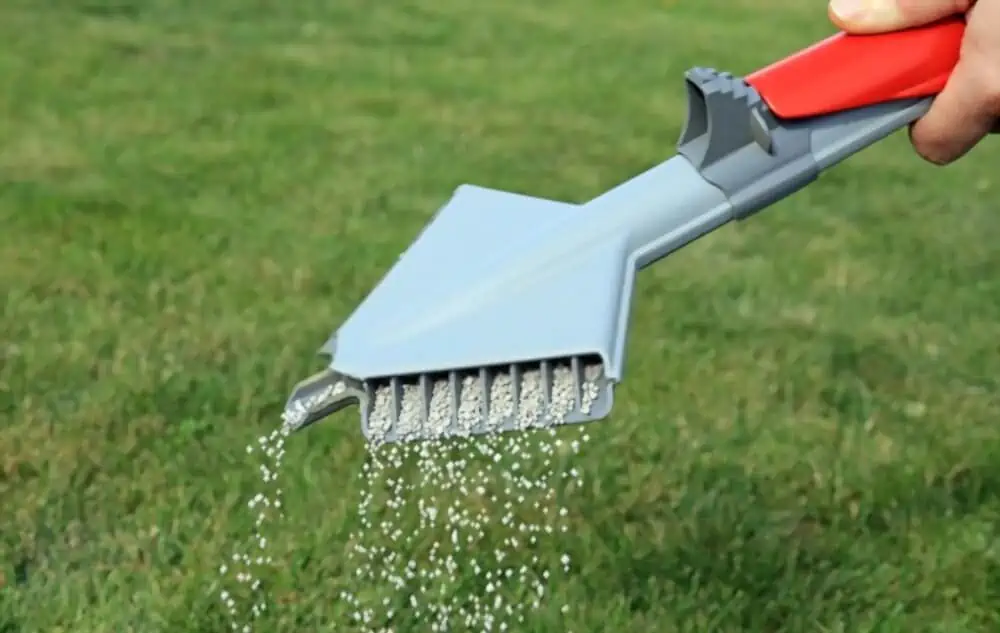 lawn fertilizer being spread