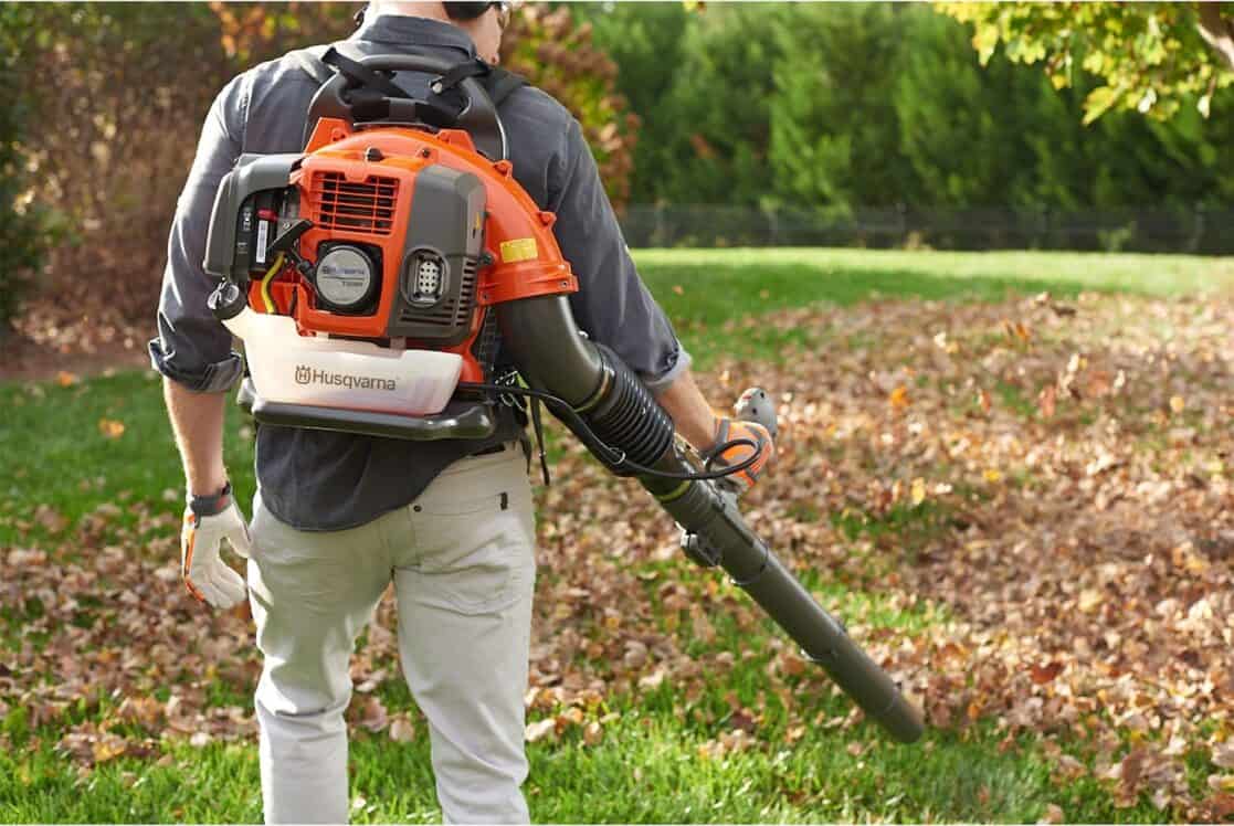 man using husqvarna 150bt