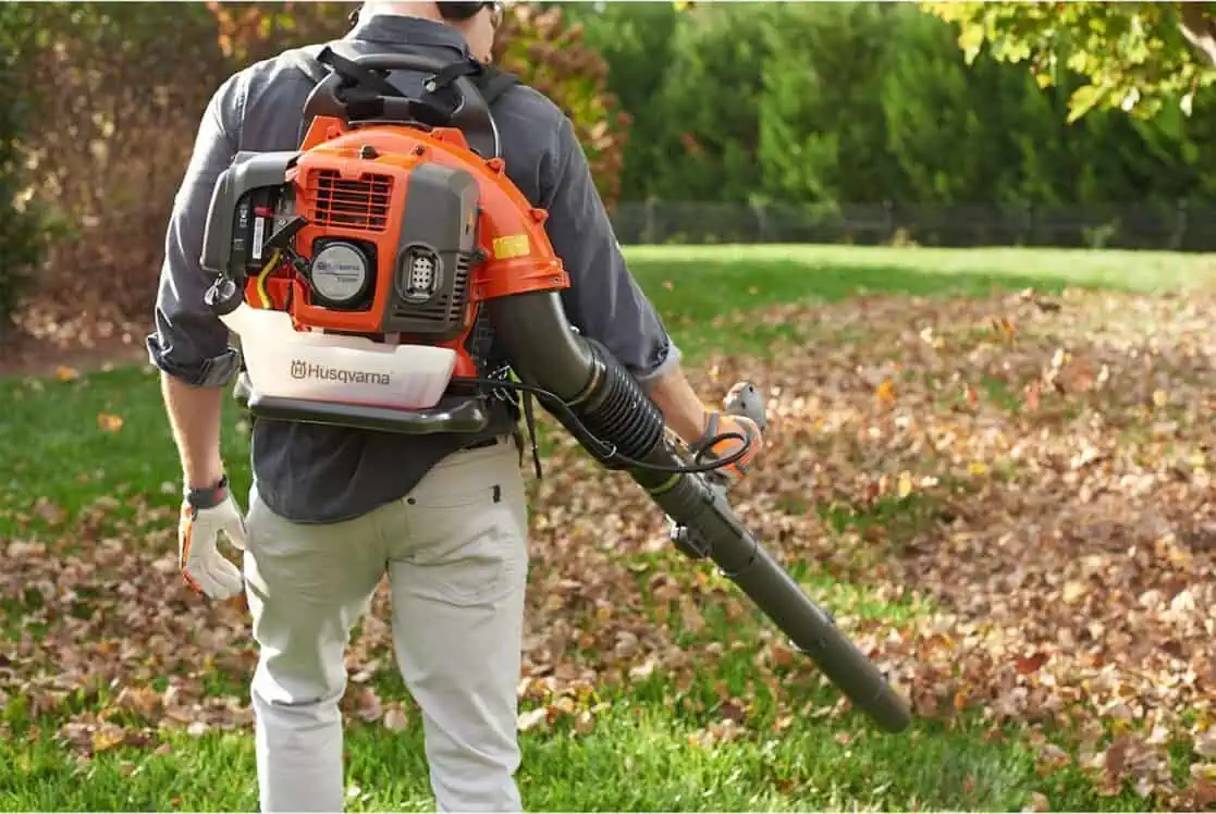 man using husqvarna 150bt