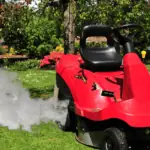 riding mower blowing white smoke when blades are engaged